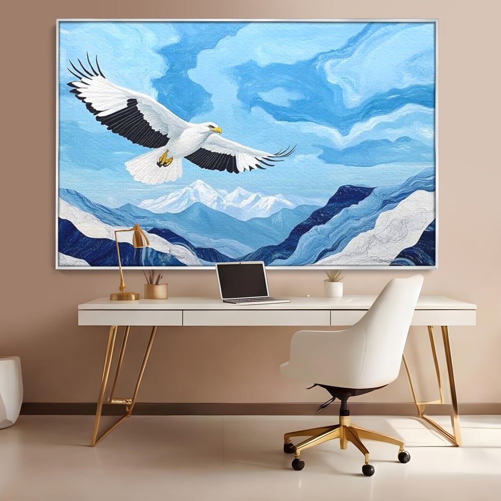 Tablou canvas cu tablou canvas cu vultur in zbor peste munti, in rama de aluminiu argintiu, pe perete intr-un birou